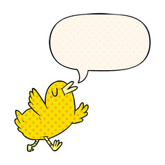cartoon happy bird and speech bubble in comic book style