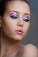 Fototapeta premium Art makeup many sequins and rhinestones of different shapes