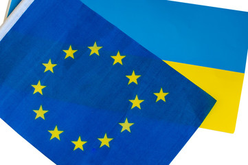 Symbolic extra star on EU flag. European Union flag and blue yellow ukrainian flag.