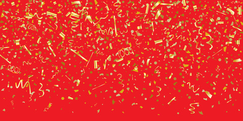 Golden glitter confetti on a red background. 