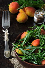 Healthy arugula salad apricot. Dietary food. Bright healthy salad. Super Food