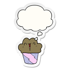 cartoon cupcake with face and thought bubble as a printed sticker