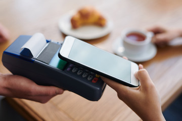 Using contactless payment in cafe