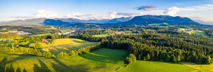 Fototapeta premium Bad Tölz, Isar Valley, Germany Bavaria. Alps Karwendel mountain. Sunset Aerial shot in June