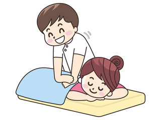 施術を行うマッサージ師の男性