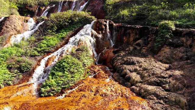 Stormy mountain river forming a cascade of waterfalls - Datanla waterfalls. Vietnam. drone view