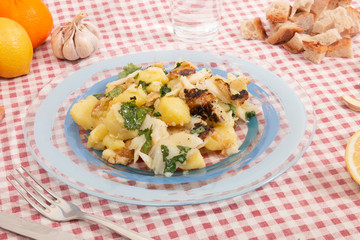 Grilled Codfish with potatoes and olive oil.