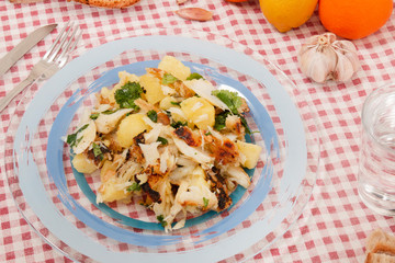Grilled Codfish with potatoes and olive oil.