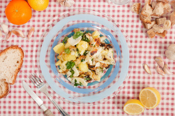 Grilled Codfish with potatoes and olive oil.