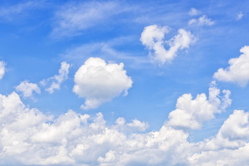Naklejka na ściany i meble Summer sky with fanciful cumulus clouds