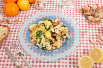 Grilled Codfish with potatoes and olive oil.