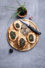 Bruschetta with black truffle ,salsa tartufata.