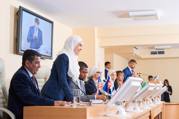 Young successful muslim female delegate in formalwear and hijab