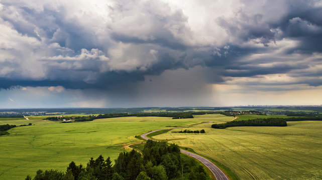 Thunderstorm over a wheat field. Rural scene in Belarus, Europe