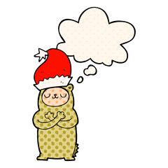 cartoon bear wearing christmas hat and thought bubble in comic book style