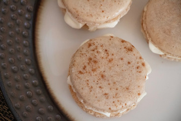 Cinnamon Bun Macaron Cookies A festive flavor. Perfect for fall or winter, Thanksgiving and Christmas. A delicate sweet treat. Baking or cooking, recipe photo.