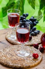 Ratafia - tipical Italian sweet alcoholic beverage, either a fruit-based beverage or a fortified wine with cherries. Rustic style.