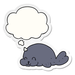 cute cartoon seal and thought bubble as a printed sticker