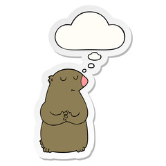 cute cartoon bear and thought bubble as a printed sticker