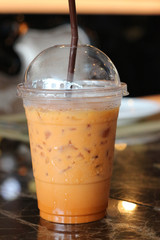 iced milk tea on table in cafe