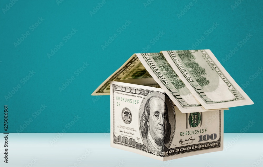 Canvas Prints Stack of money with house on background