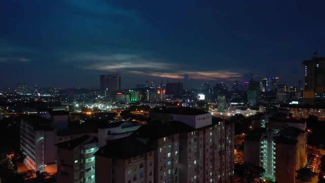 night time illuminated kuala lumpur cityscape aerial panorama 4k malaysia