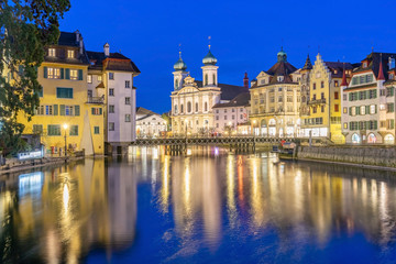 Fototapeta na wymiar View of the historic city center of Luzern, Jesuitenkirche church and Reuss river, Luzern, Switzerland