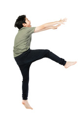 Obraz premium Portrait of happy little Asian child jumping isolated on white