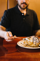 Man eating Fried Ice cream