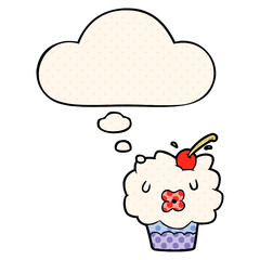 cartoon cupcake and thought bubble in comic book style