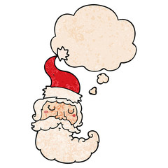 cartoon santa face and thought bubble in grunge texture pattern style