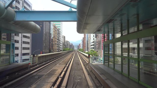 Taipei metro station system. Taipei cityscape, view from the MRT Wenhu line compartment ( 4K UHD time-lapse )