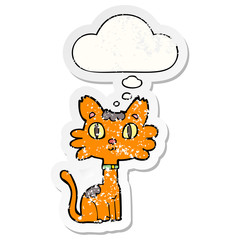 cartoon cat and thought bubble as a distressed worn sticker
