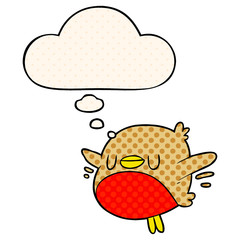 cartoon christmas robin and thought bubble in comic book style