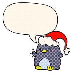 cartoon penguin wearing christmas hat and speech bubble in comic book style
