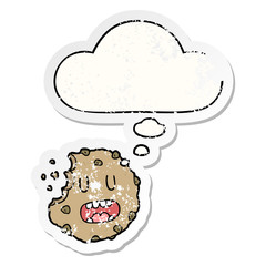 cartoon cookie and thought bubble as a distressed worn sticker