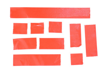close up of red adhesive tape on white background