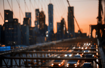New York City Brooklyn Bridge defocused abstract city night lights background