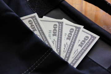 American bank note on bag. 100  dollars on  business bag,dollars money is world wild.