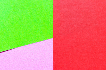 Abstract green, pink and red color paper textured background with copy space for design and decoration