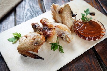 pieces of fried chicken with tomato sauce