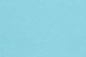 Light blue paper texture. Pastel color abstract background.