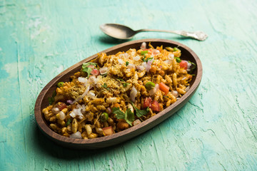 Bhelpuri Chaat/chay is a road side tasty food from India, served in a bowl or plate. selective focus