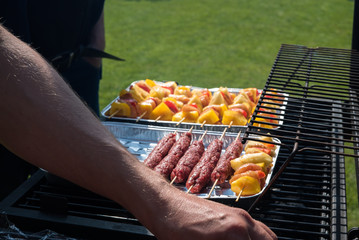  grilling meat and vegetables outdoor
