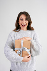 Portrait of screaming woman with gift