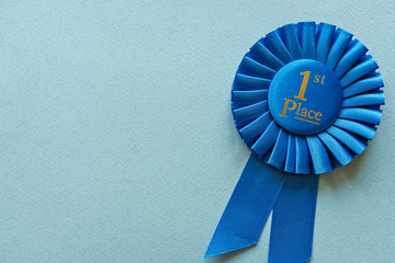 Champion or Winners 1st Place blue rosette - obrazy, fototapety, plakaty