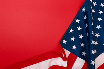 American flag on red background  top view .