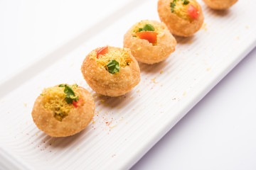 Sev puri - Indian snack and a type of chaat. Popular in Mumbai/pune from Maharashtra. it's a roadside food also served as a starter in restaurants