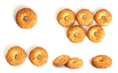 A variety of shaped cookies. White cup of tea. Morning is sweet. Tea ceremony.