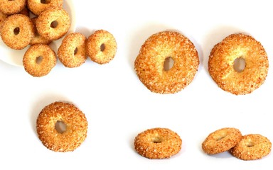 A variety of shaped cookies. White cup of tea. Morning is sweet. Tea ceremony.